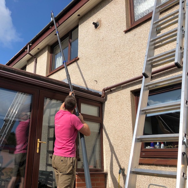 gutter cleaning in action